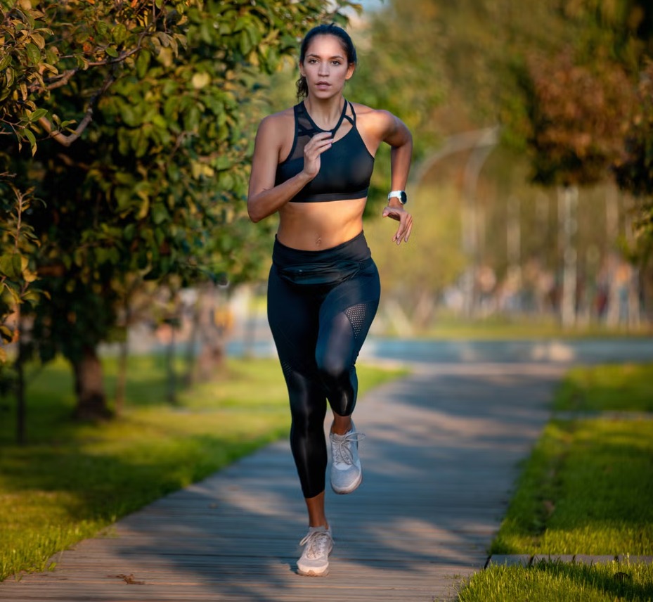 Runners training together at sunrise